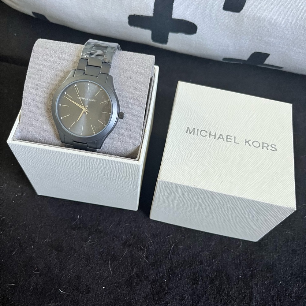 MK aluminum watch .. I feel like this watch is unisex